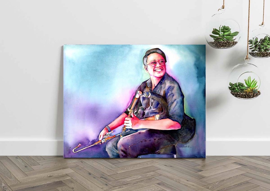 This is Faliq painting by Jamie Hansen, pipes player in purple and blue